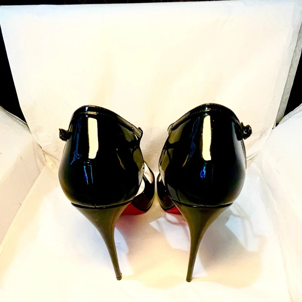 Christian Louboutin caged ankle strap peeptoe pumps. Glossy patent black 38.5